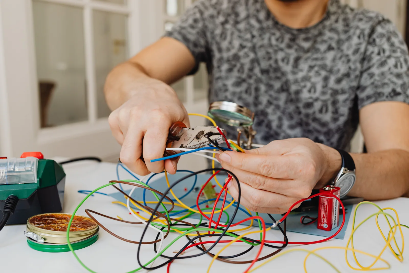 Stripping and sorting conductors at the bench, for electrician in Warren