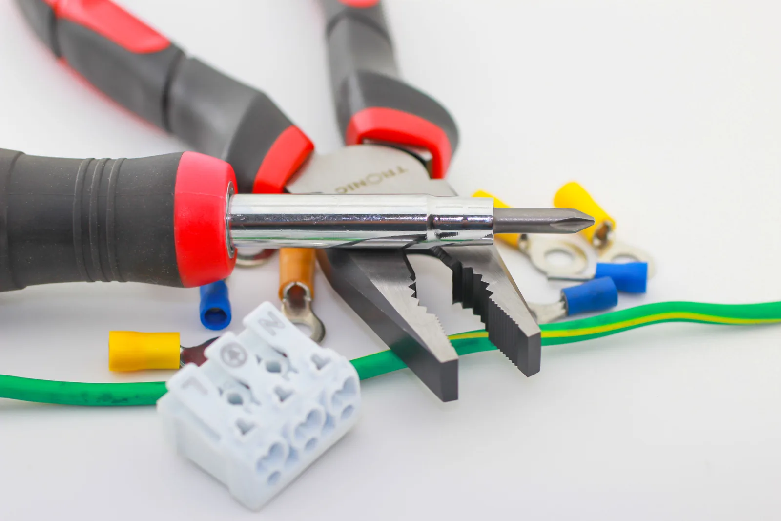 Pliers, a screwdriver, ferrules and a connector block, for electrician in Detroit