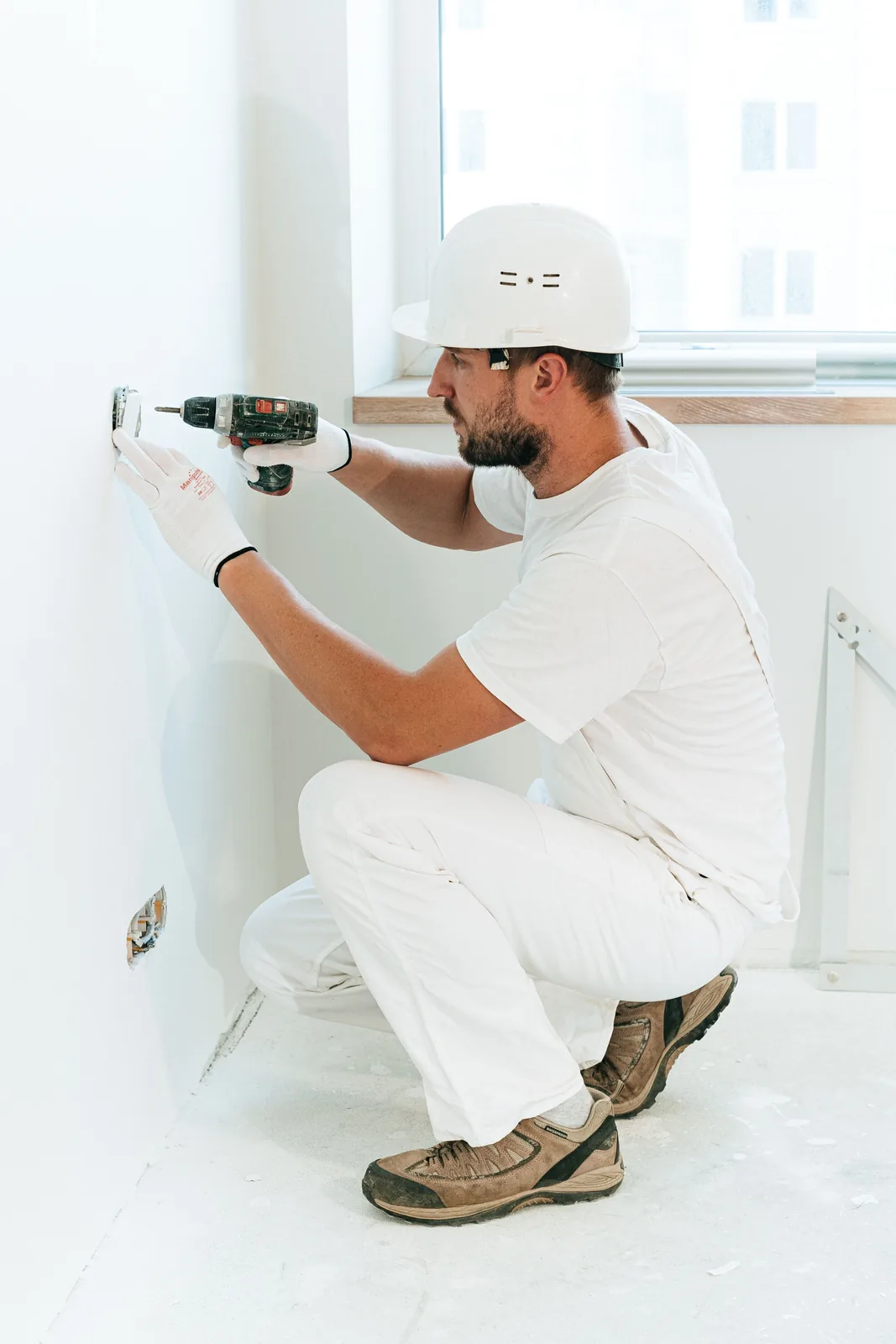 Fixing a socket into a finished wall, for electrician in Detroit